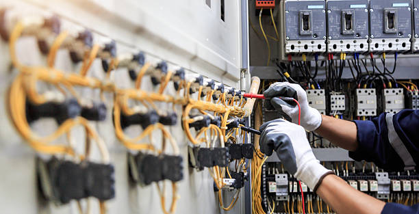 Professional Electrician technician working in Mikes, TX